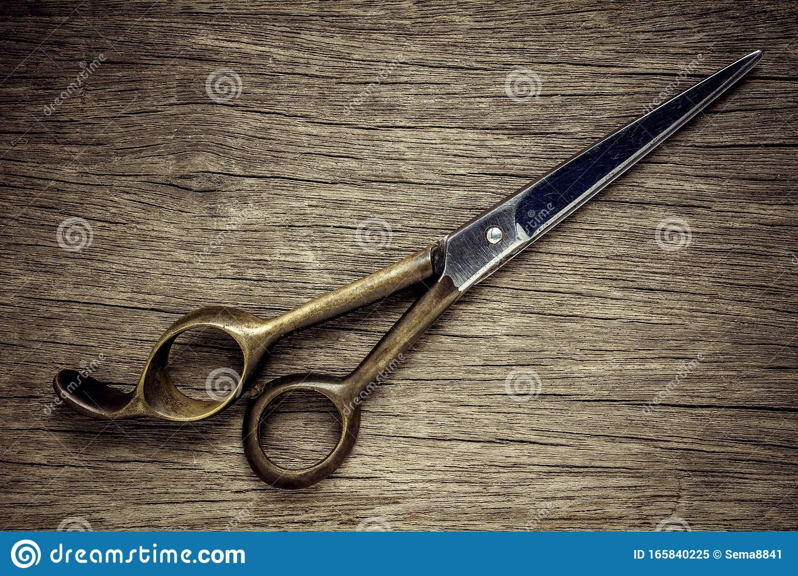 1600 x 1155 · jpeg - Old Hairdressing Scissors On Wood Background. - Vintage Style Backdrop ...